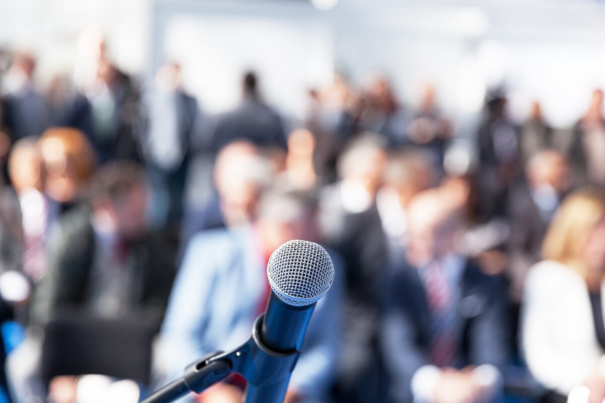 corporate-conference-microphone-audience
