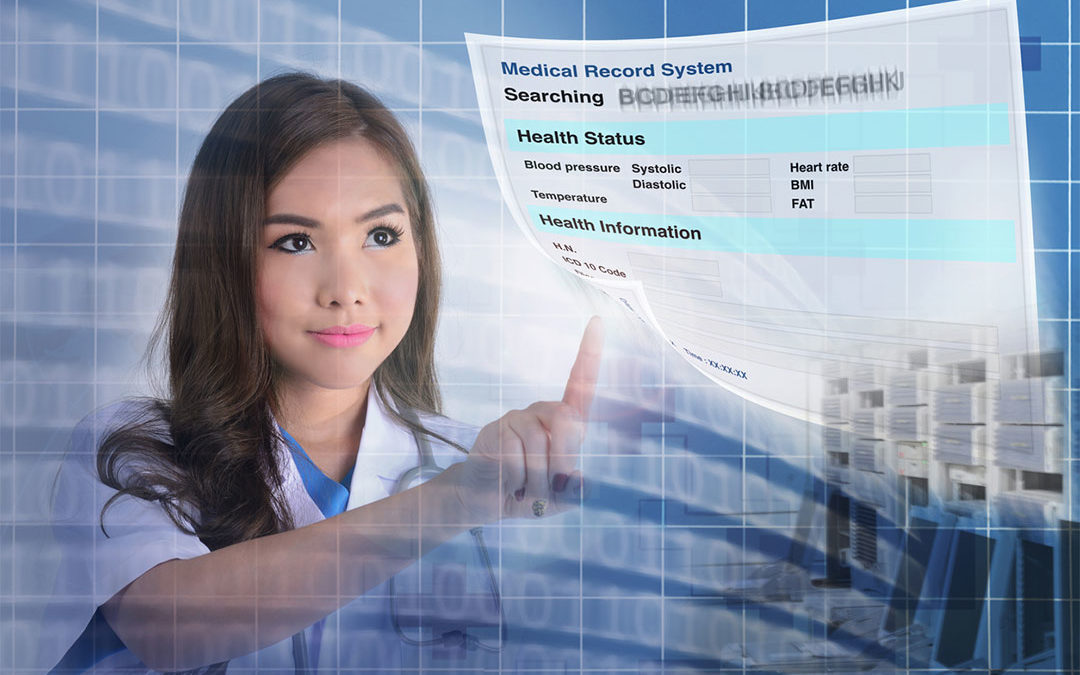 Woman viewing an electronic medical records screen.