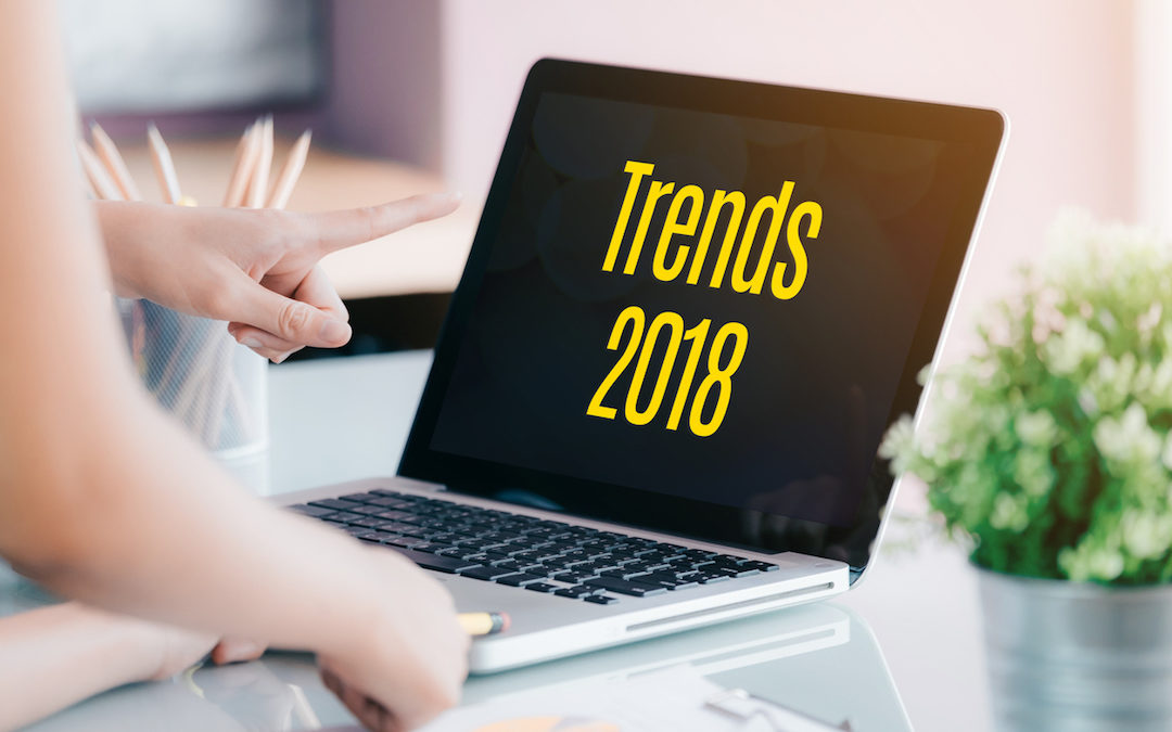 Laptop screen introducing 2018 trends in TJC survey outcomes.