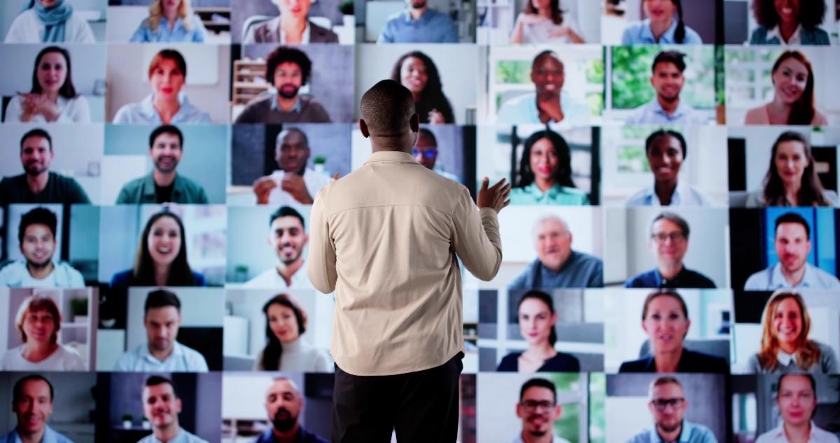 male-educator-manages-online-conference