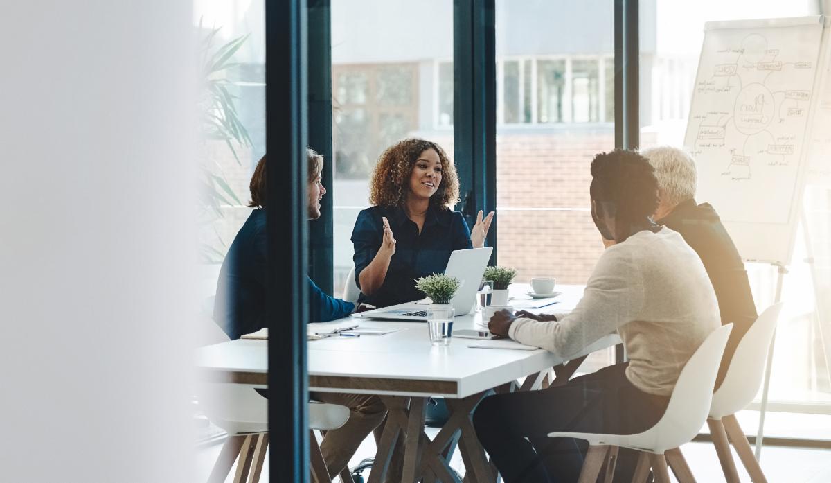 team-meeting-through-glass-wall
