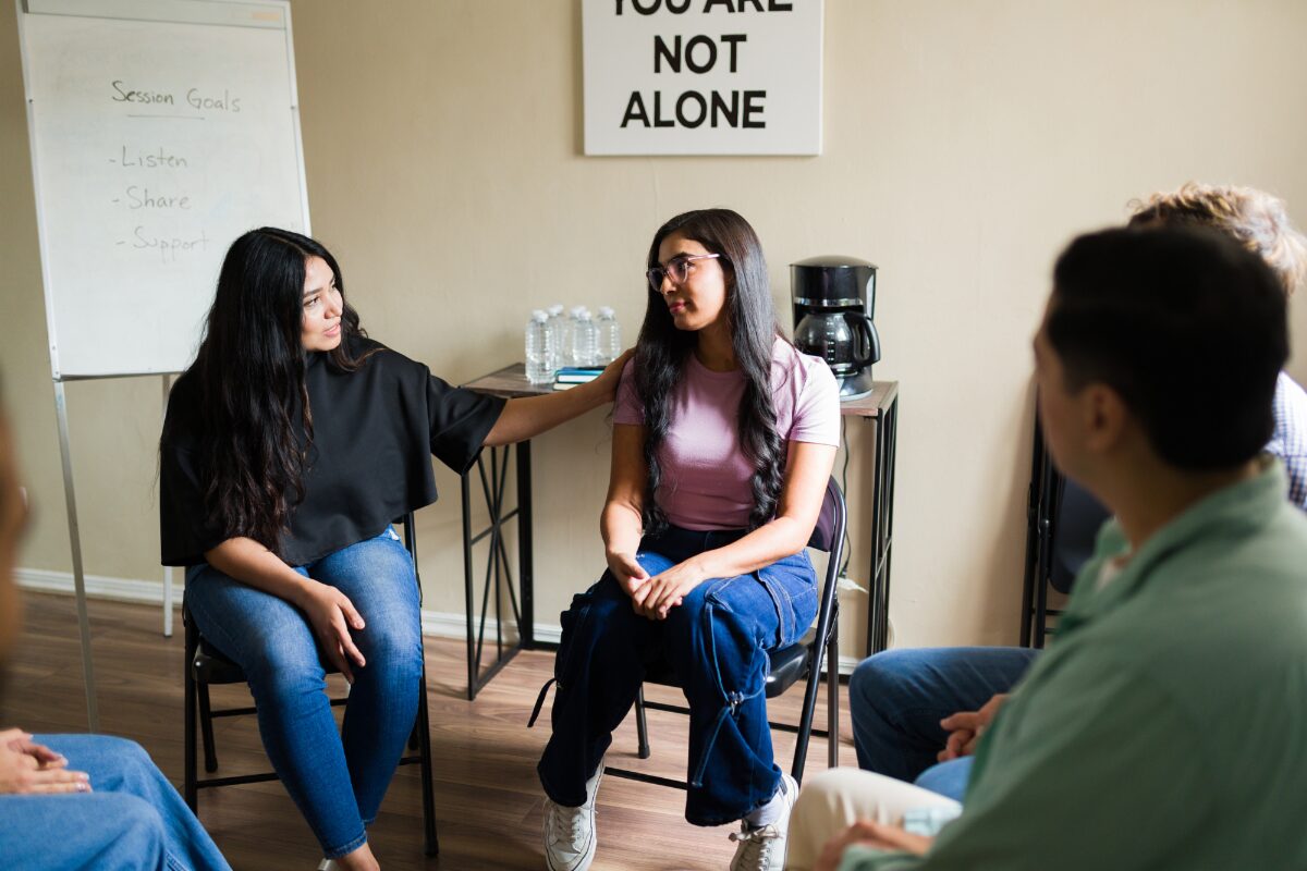 woman-being-comforted-during-therapy