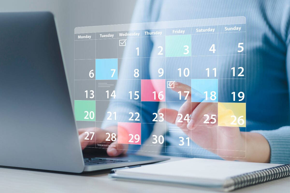 woman-clicking-computer-calendar